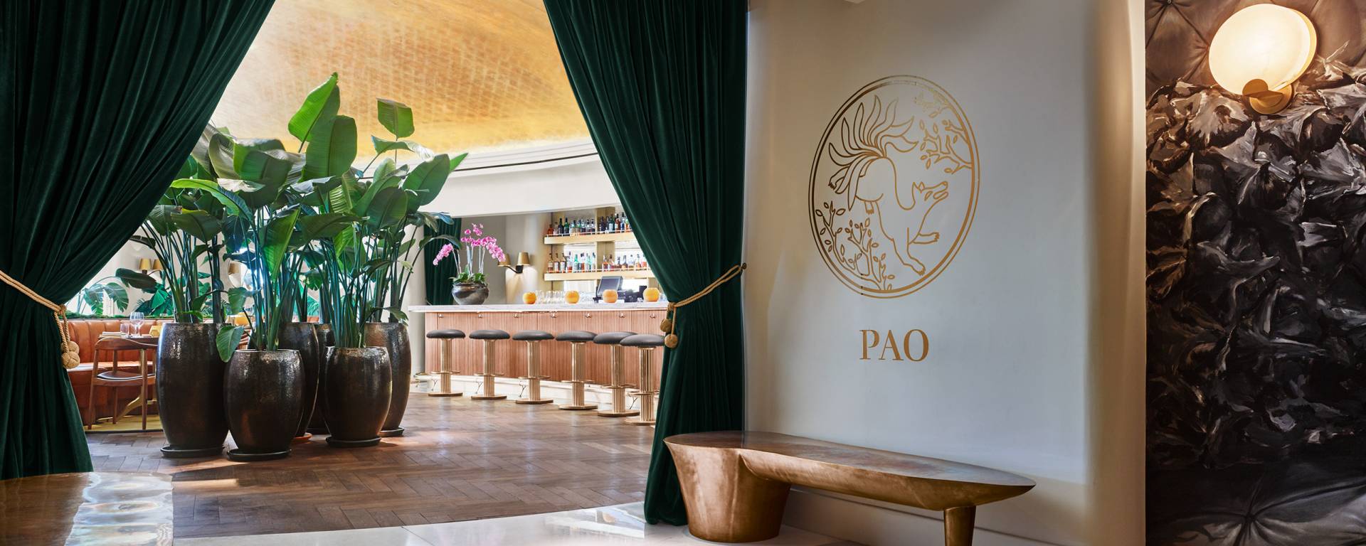 entrance to Peo with benches and tall plants