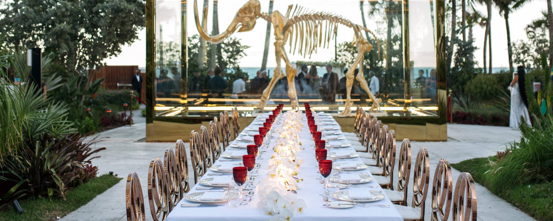 long dining table set outside for wedding reception