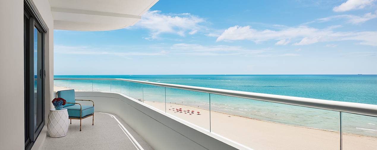 balcony overlooking beach and ocean