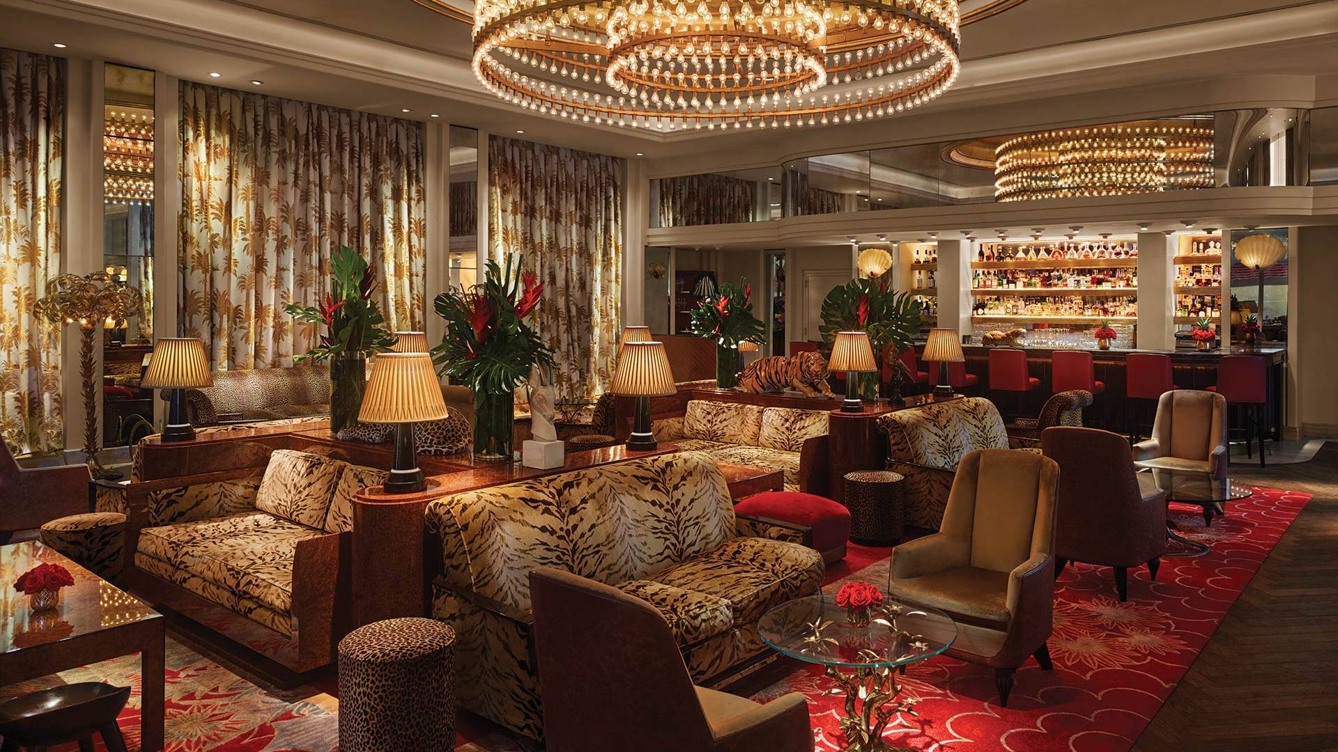 bar and lounge area filled with animal print couches