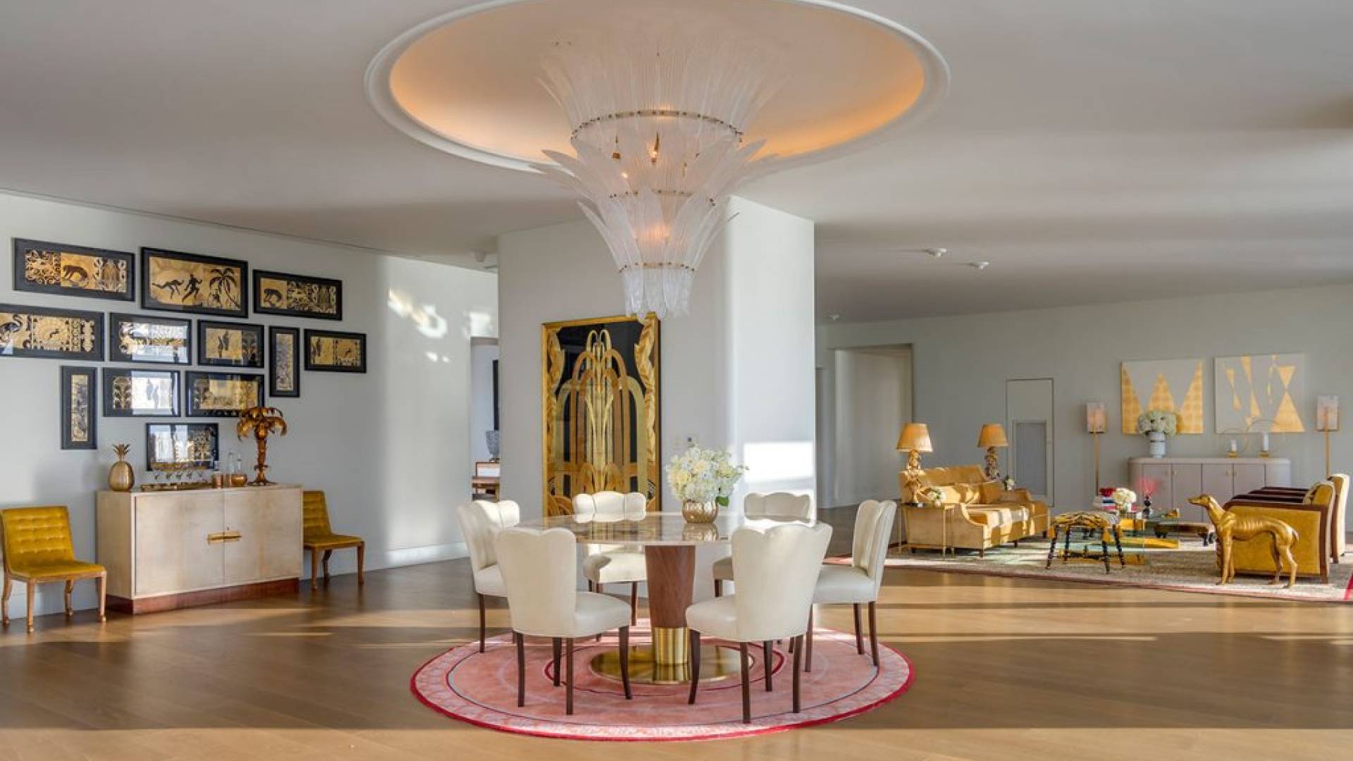 hotel penthouse open space with dining and living areas