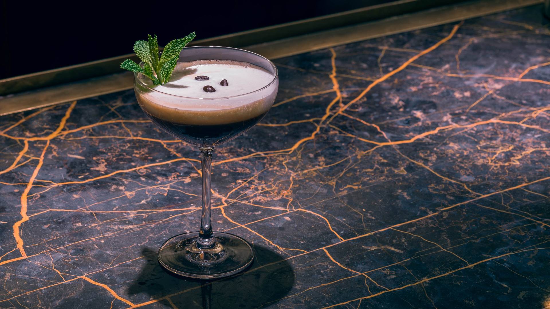 cocktail with garnish on a bar