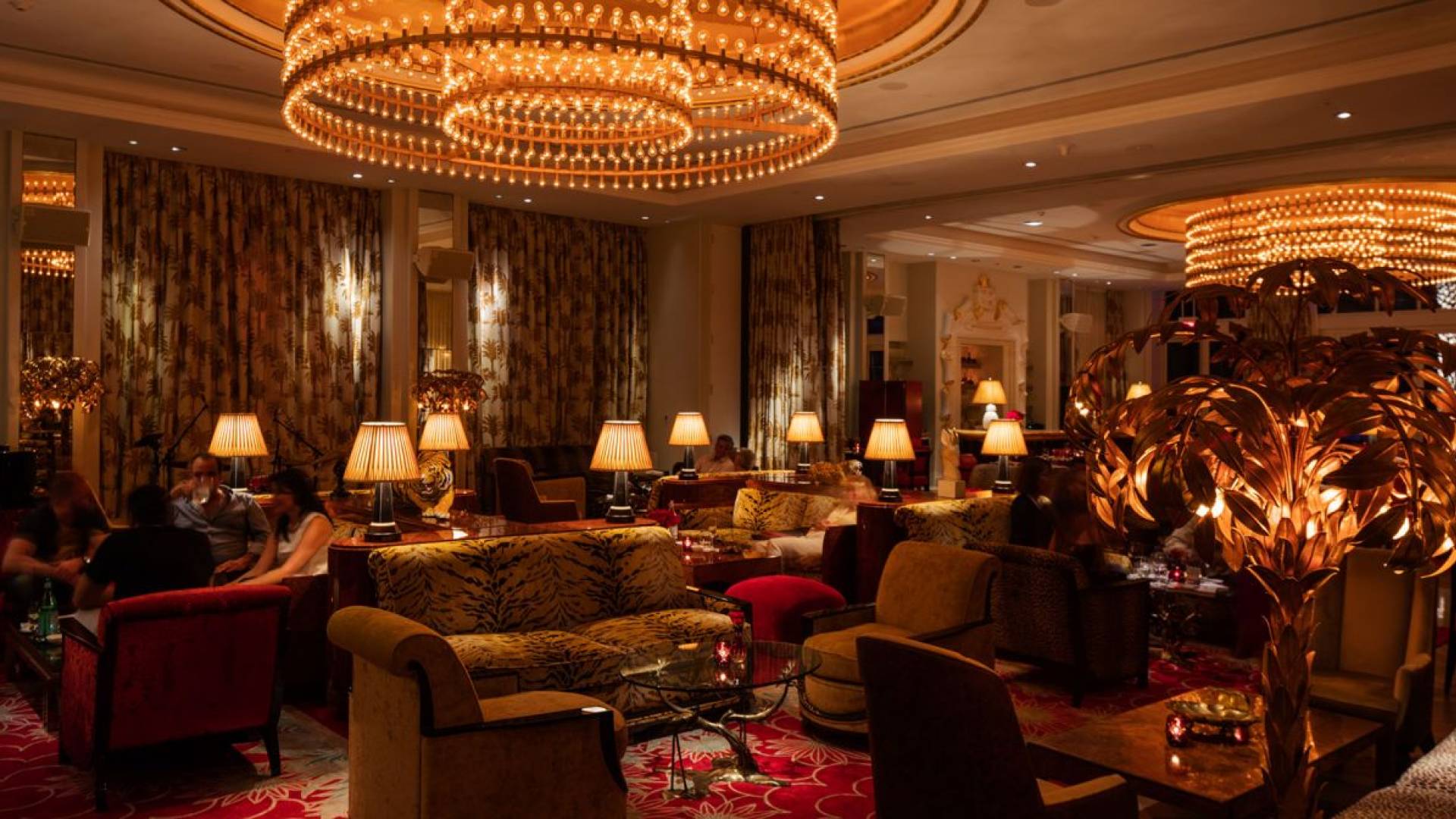 Dimly lit lounge area with couches