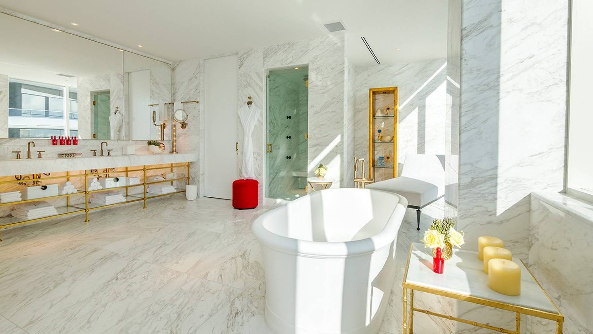 hotel bathroom with large stand alone bathtub