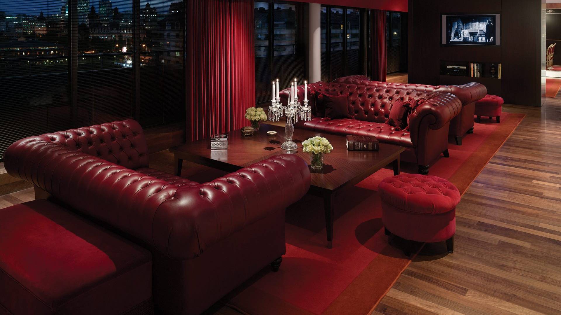 living room with leather couches in hotel suite