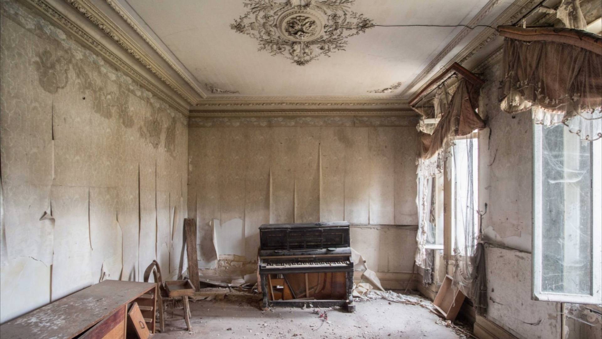 Piano sits in abandoned room
