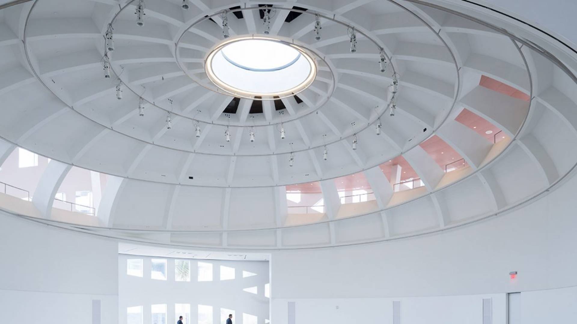 indoor ceiling shot of white sphere-shaped building