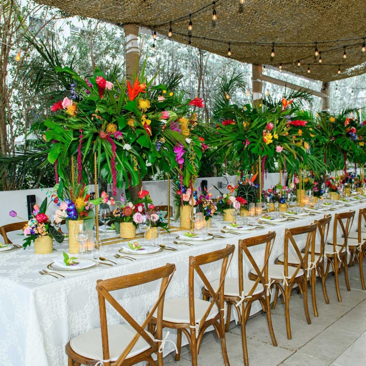 Dining area under burlap canopy