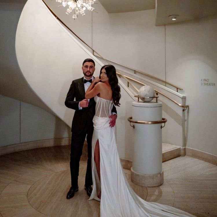 bride and groom in stair well