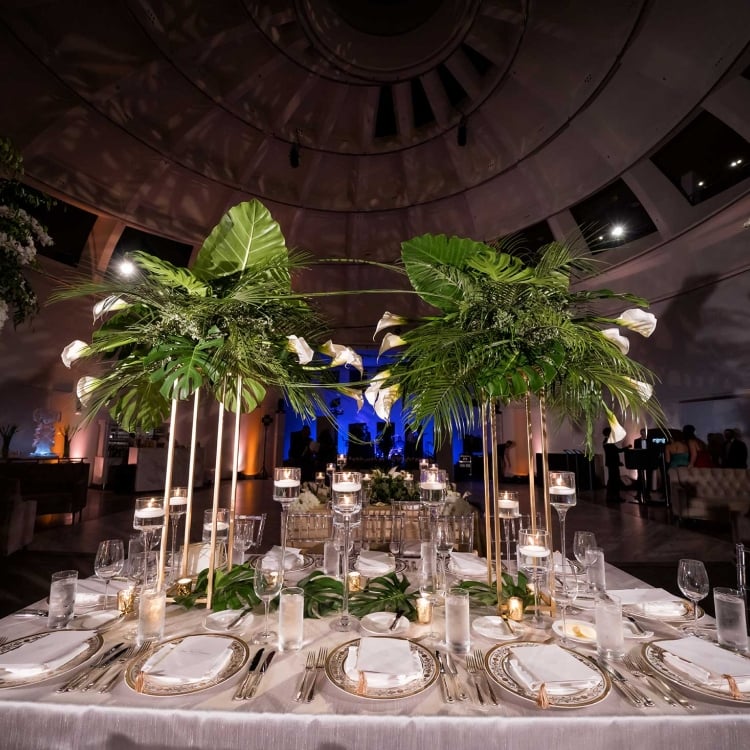 Table setting with mini palm tree center pieces