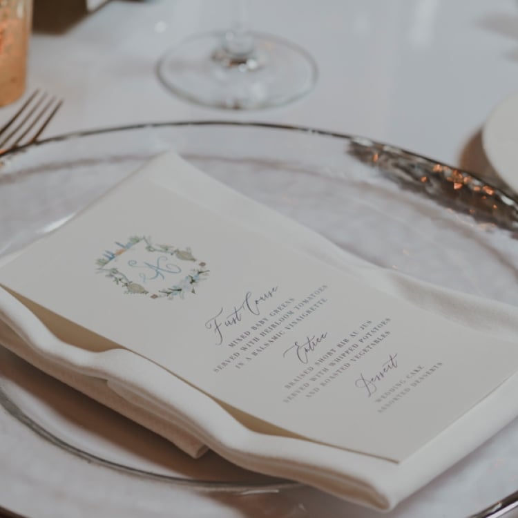 Plate with wedding menu on it