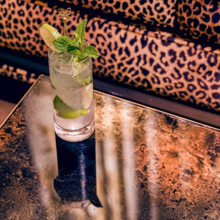 Fancy cocktail served at the Living Room at Faena