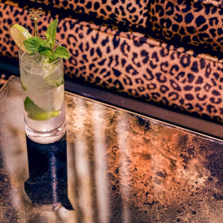 Fancy cocktail served at the Living Room at Faena