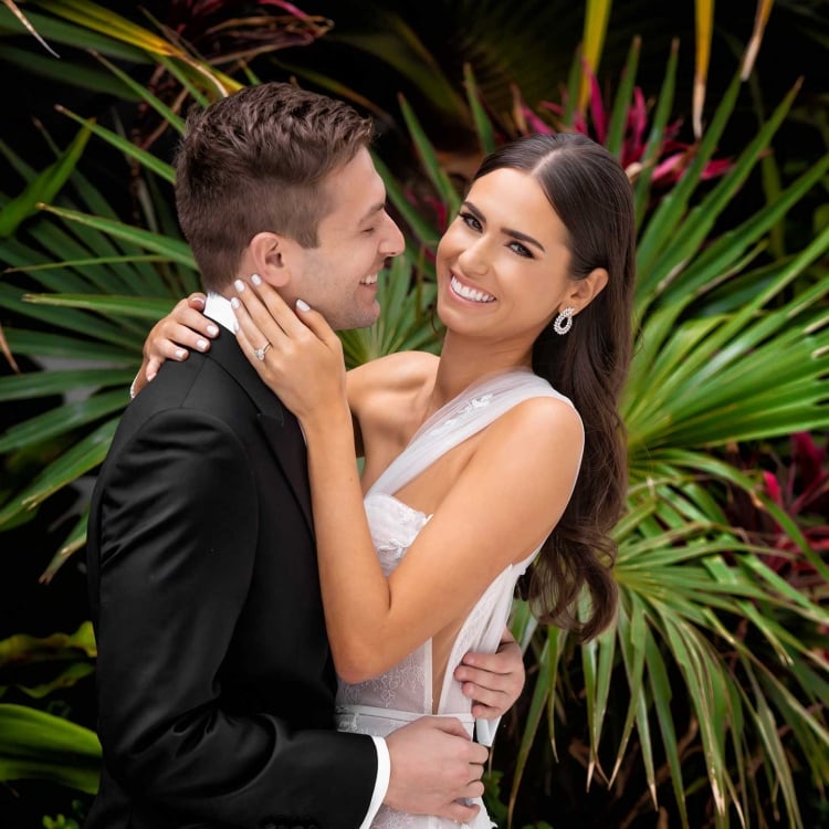 Husband and wife holding eachother