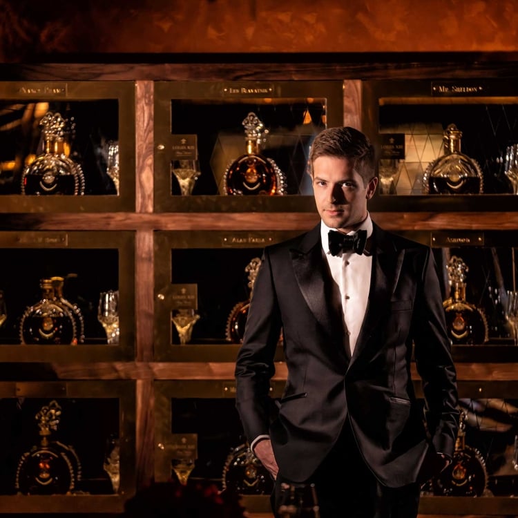 Groom in dark cellar