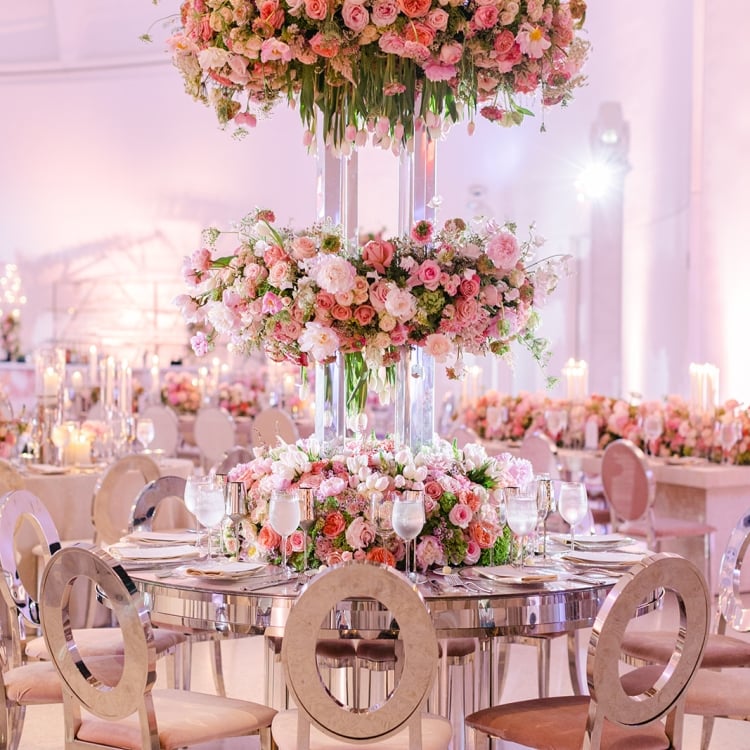 Centerpiece at Allison and Robert Zale's Wedding with three tiers of flowers
