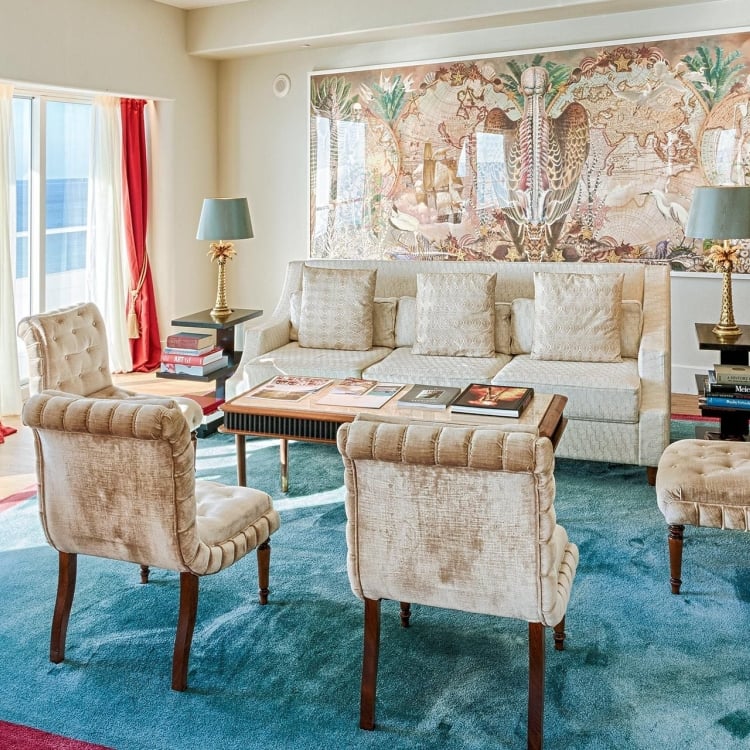 couch and four chairs in faena hotel suite