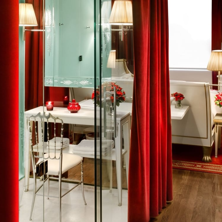 hotel vanity bathroom with velvet curtains