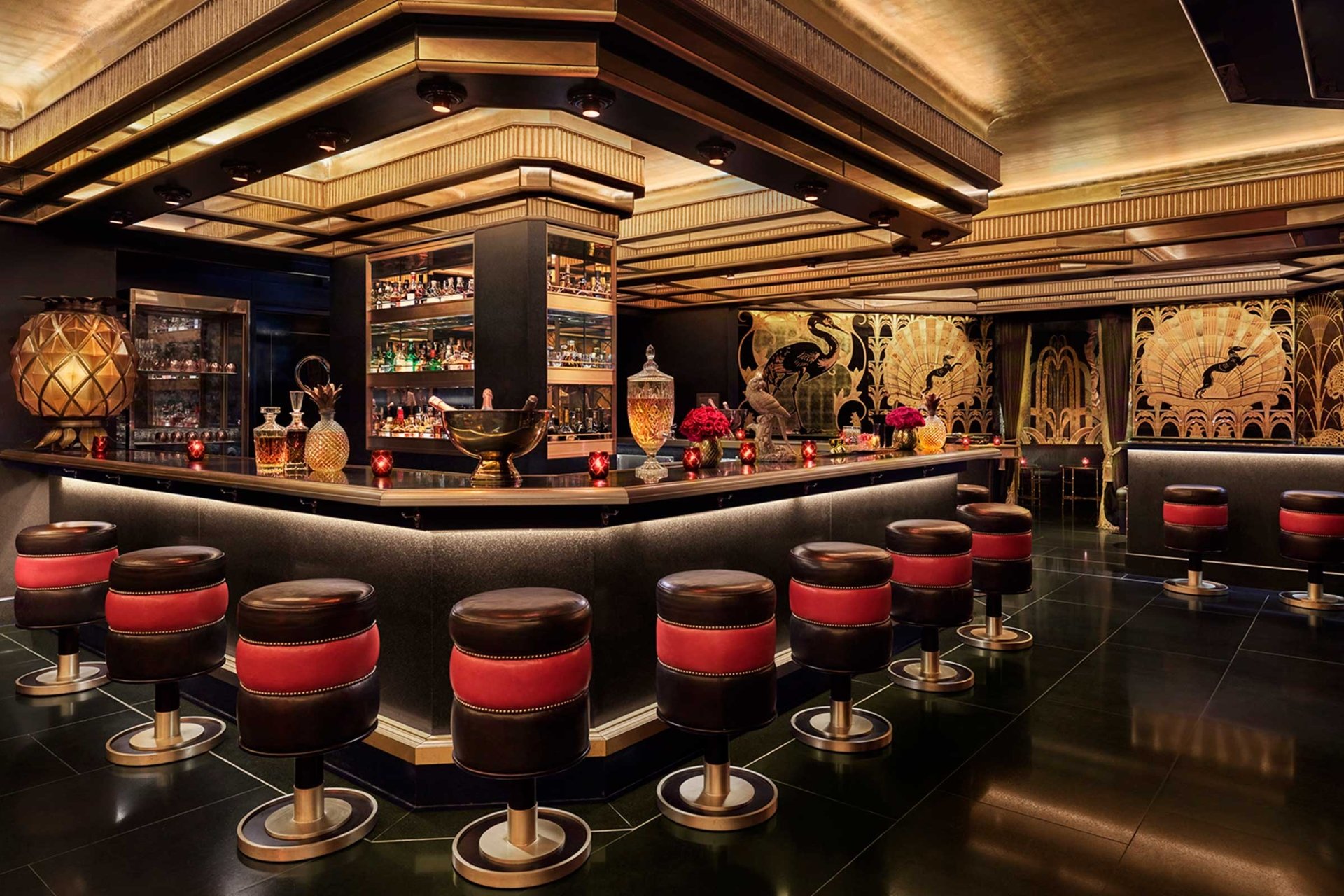 saxony bar interior with red and black stools at the bar