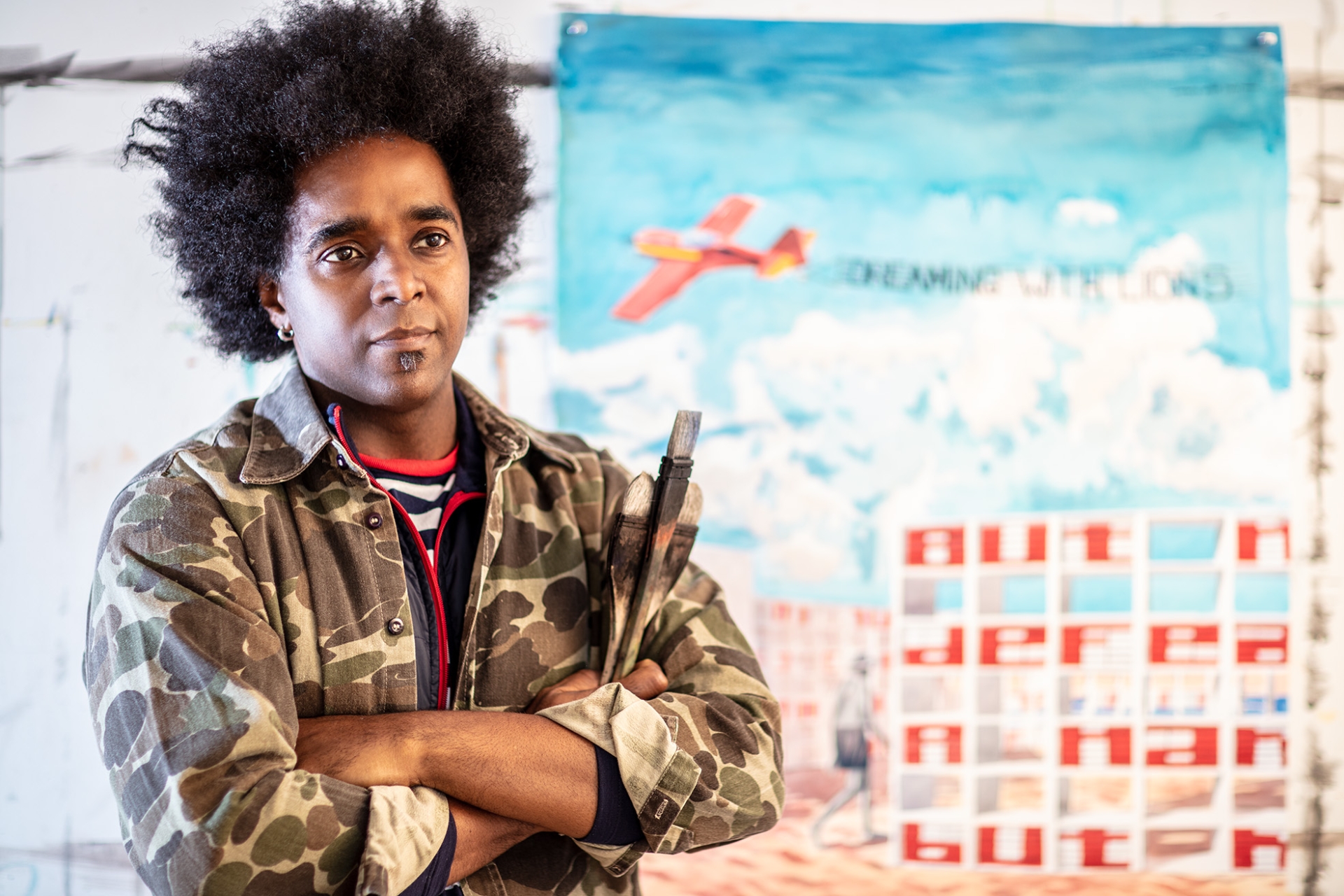 Alexandre Arrechea Cuban Artist with painting