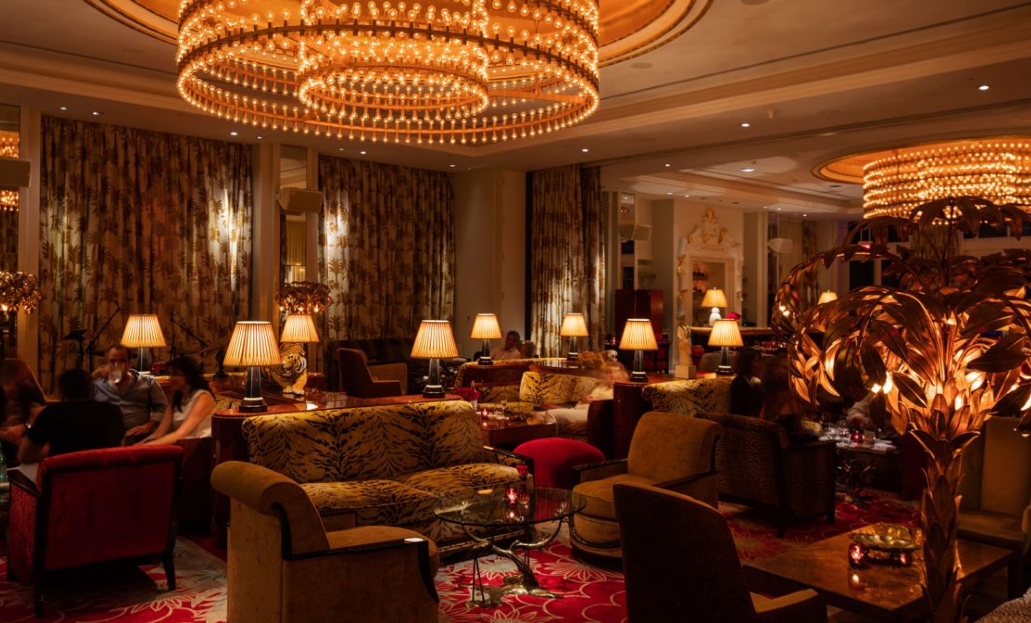 Dimly lit lounge area with couches 