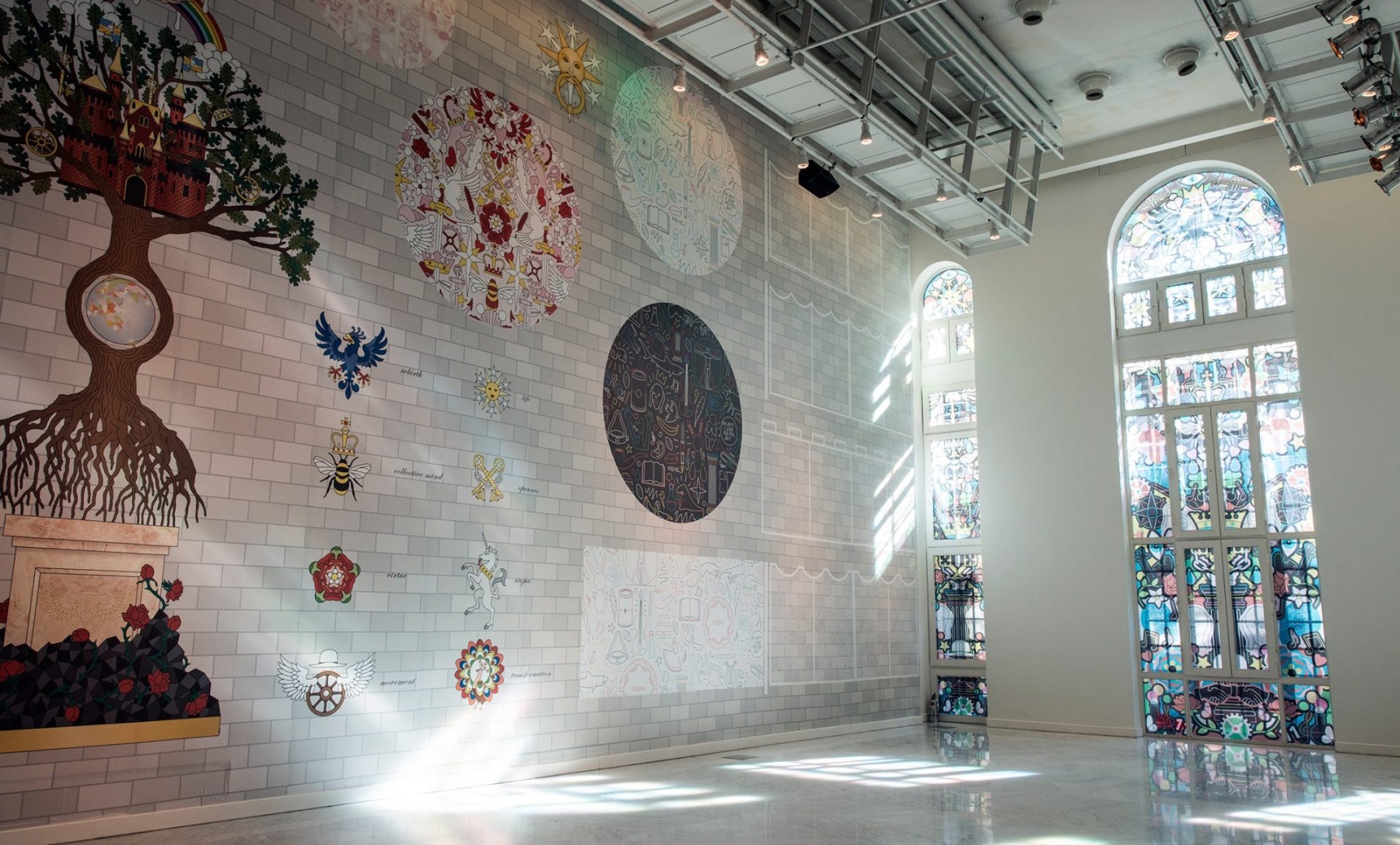 Faena Art Center large room with stained glass windows