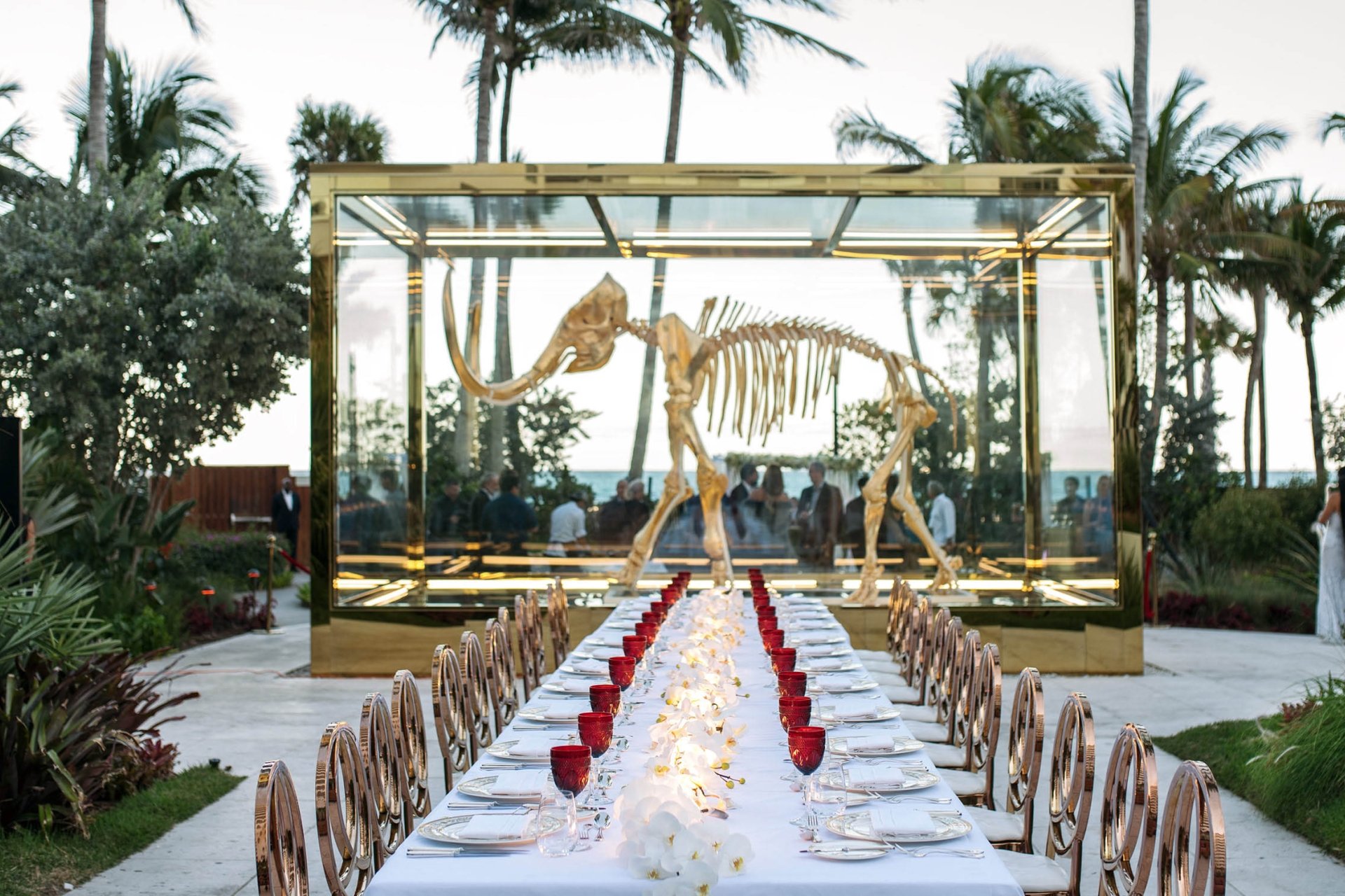 long dining table set outside for wedding reception