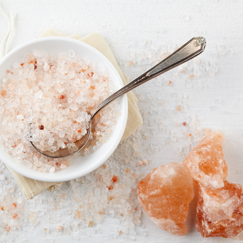 Salt scrub in a dish with a spoon