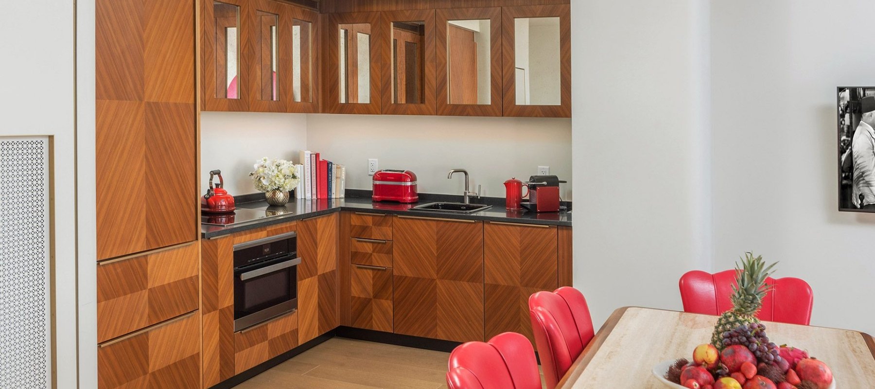 Kitchen with wood paneled cupboards