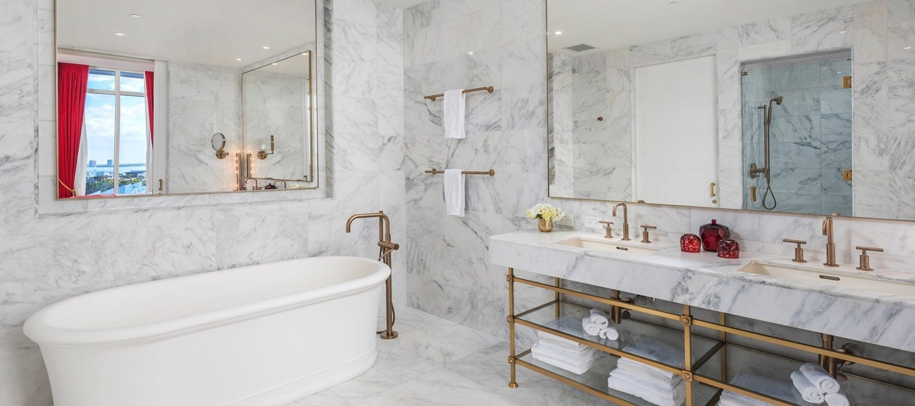 hotel bathroom with large stand alone bathtub
