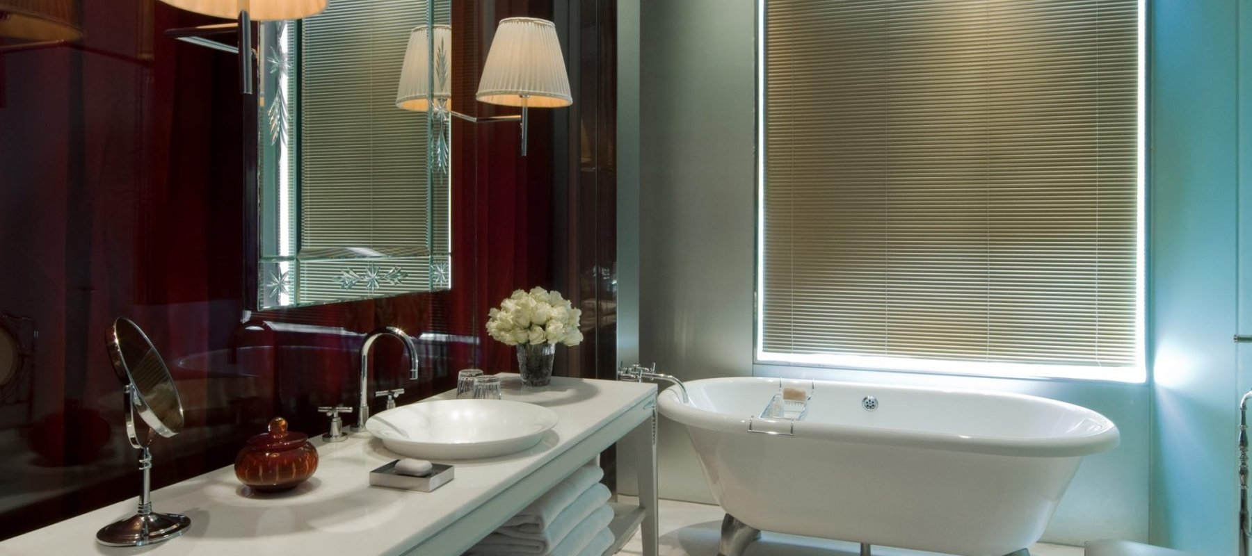hotel bathroom with large stand alone bathtub