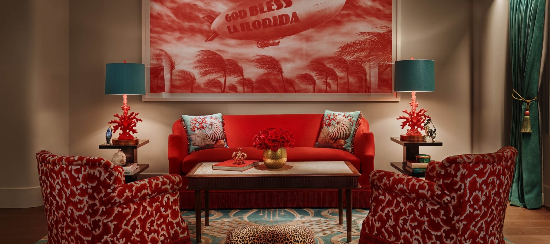 living room in hotel suite with large red painting