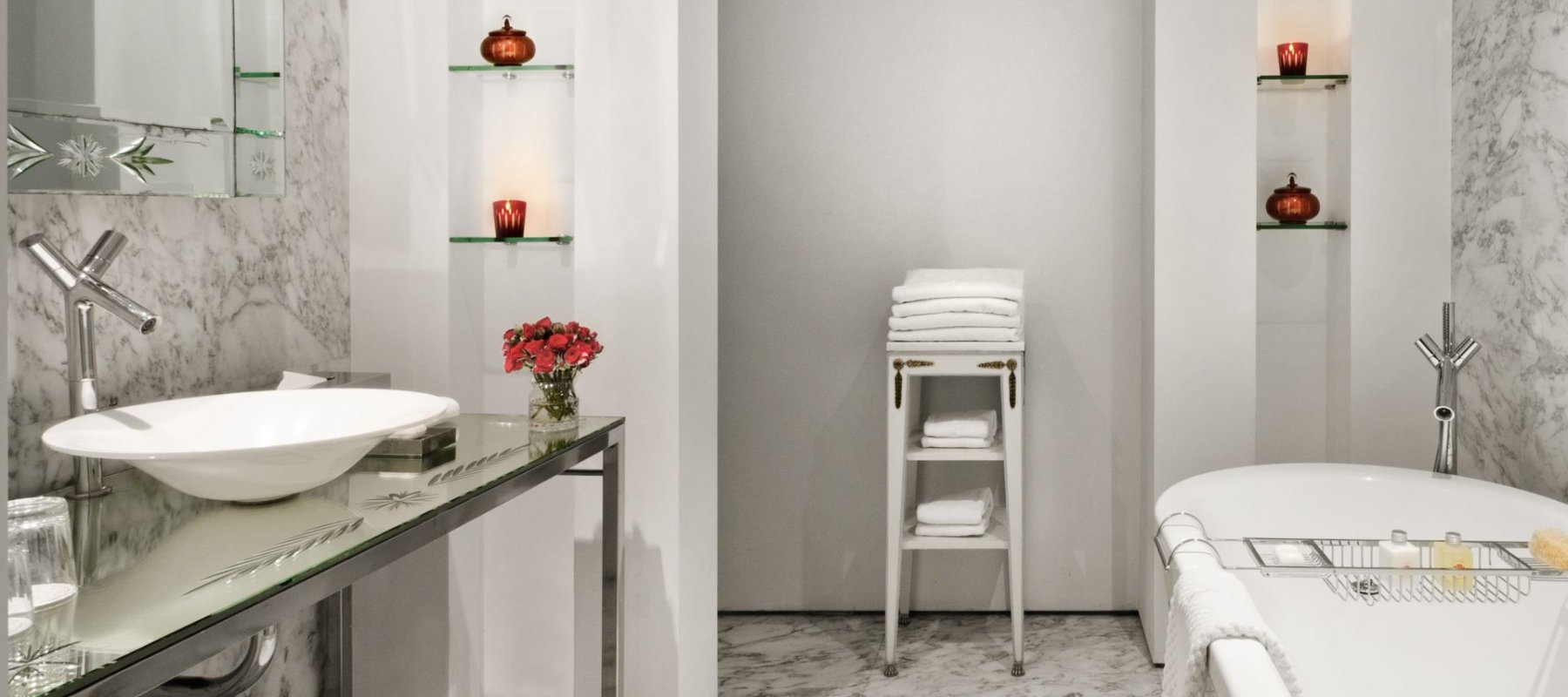 hotel bathroom with large stand alone bathtub