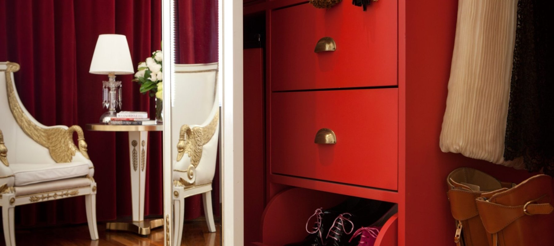 hotel closet dress with large mirror and chair