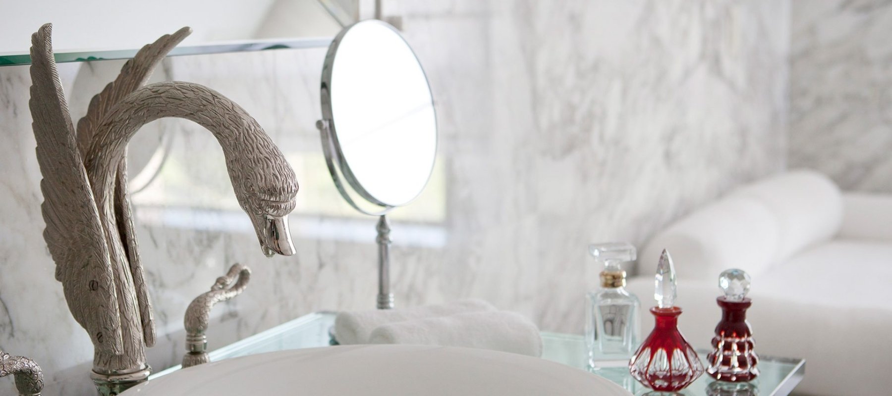 basin sink with swan faucet in tower suite