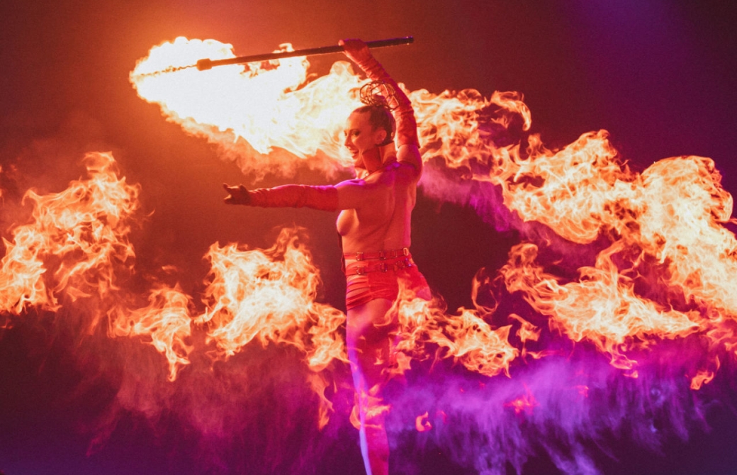 Woman dancing with fire
