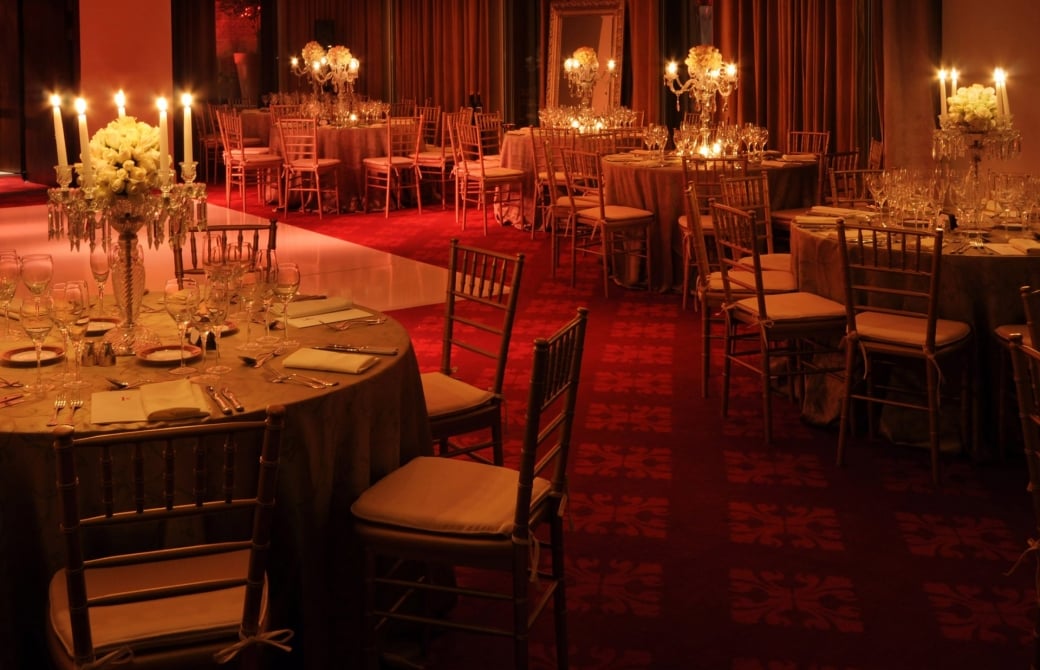 Interior view of the ballroom with reception tables and candle light