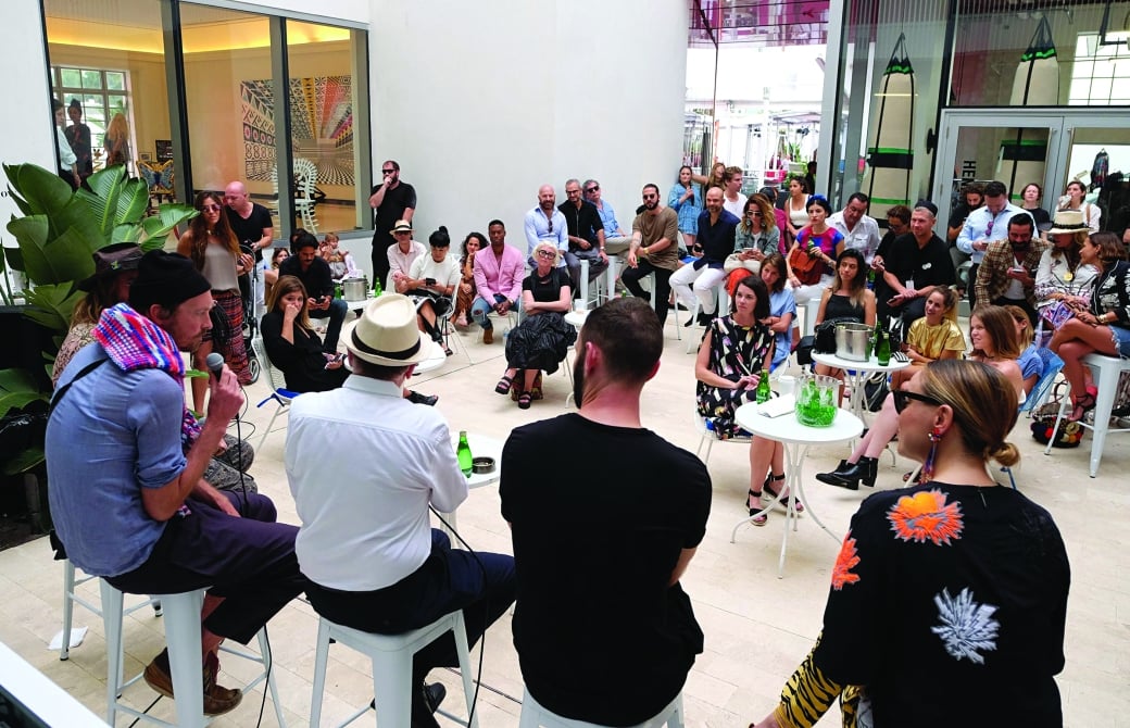 Group of people in a talk at Faena Bazaar