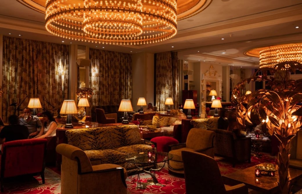 Dimly lit lounge area with couches 