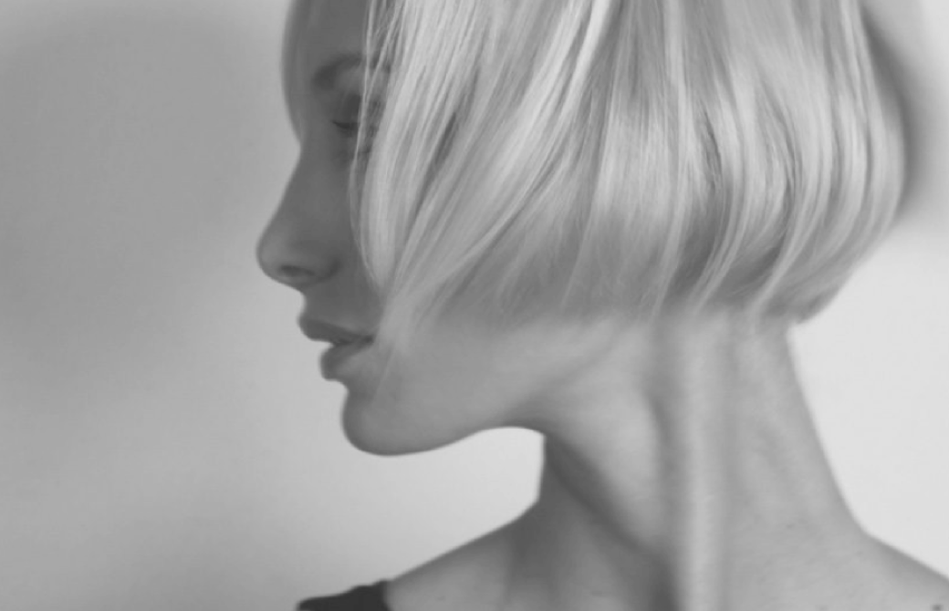 woman looks over her shoulder