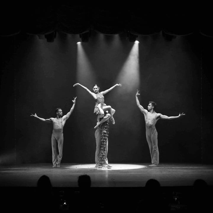 ballet hispanico four dancers on stage