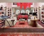 casa faena atrium with bookshelves and couches