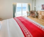 faena suite hotel bedroom overlooking the beach