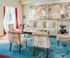 couch and four chairs in faena hotel suite