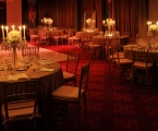 Interior view of the ballroom with reception tables and candle light