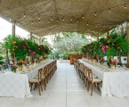 Dining area under burlap canopy