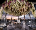 close up of floral wedding arch in Faena Forum