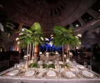 Table setting with mini palm tree center pieces