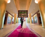 bride and groom stand in Faena entrance
