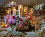 table setting with flowers and candles